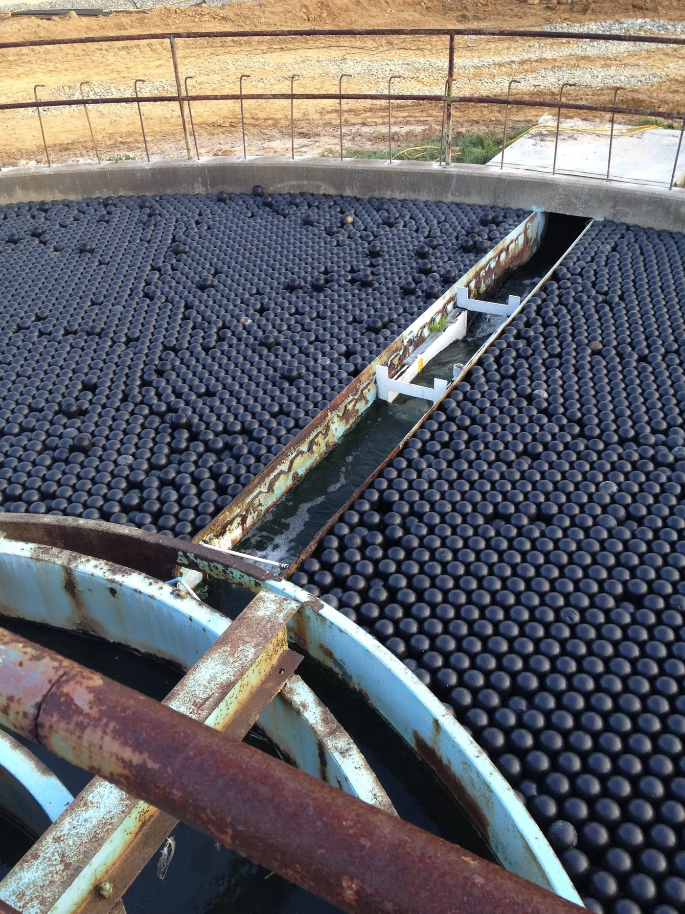 Armor Ball® covers blanketing the surface of a circular industrial clarifier basin.